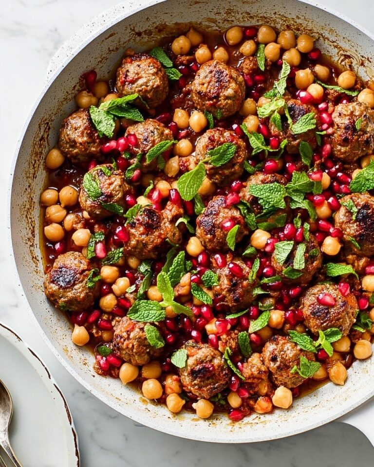 Spiced Lamb Meatball Stew with Chickpeas, Pomegranate Seeds, and Fresh Herbs Recipe