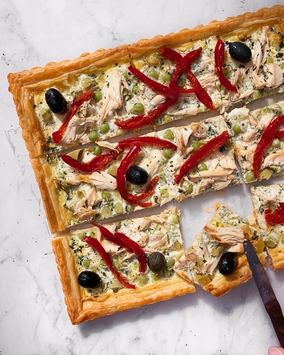 A rectangular pizza on a white rectangular plate with a thin golden crust. The pizza has three layers: the base crust, a creamy white cheese and herb spread with green flecks, and toppings of sliced white chicken, whole black olives, green peas, and long strips of roasted red pepper placed diagonally across. One square piece is cut and slightly lifted by a woman's hand using a knife with a wooden handle at the bottom left of the plate. The background is a white marbled surface. Photo taken with an iphone --ar 4:5 --v 7