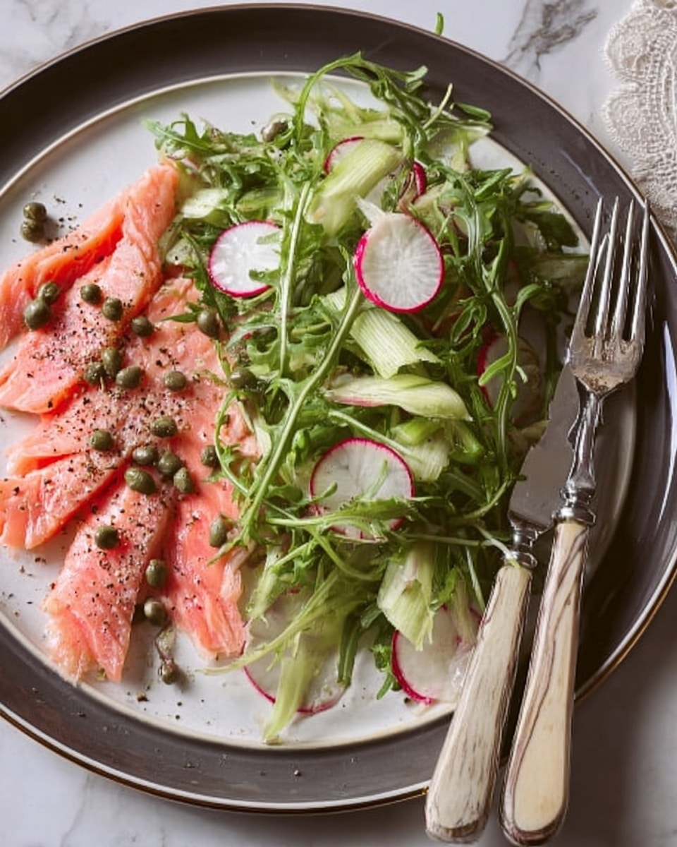 A white plate holds a meal with two main parts: on the left, several pieces of light pink cooked salmon with visible black pepper sprinkled on top; on the right, a fresh salad made of green leafy arugula, thinly sliced pale green celery, and small round slices of white and pink radish, topped with some small capers. Next to the food, there is a silver fork and knife resting on the plate, with a white marbled surface underneath. photo taken with an iphone --ar 4:5 --v 7