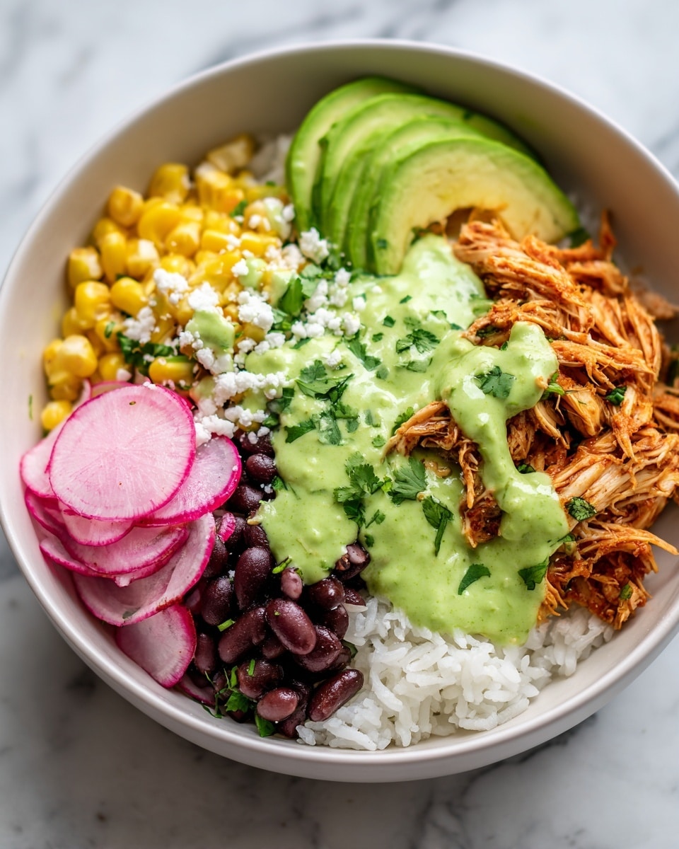 A white bowl filled with a colorful layered meal sits on a white marbled surface. At the base, there is a layer of fluffy white rice covering half of the bowl. On top, shredded orange-brown chicken is placed on the right side. Above the chicken, slices of light green avocado rest against the rice. To the left of the chicken, brown-black beans form a neat section. At the bottom left, bright yellow sweet corn kernels are clustered. Above the corn, thin, translucent pink and white radish slices are arranged in a small pile. A generous drizzle of vivid green sauce covers parts of the chicken, avocado, and beans, sprinkled with white crumbled cheese and small pieces of chopped cilantro leaves for garnish. The whole composition is vibrant, fresh, and well organized. photo taken with an iphone --ar 4:5 --v 7