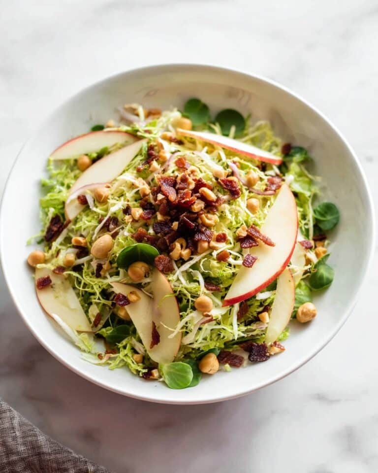 Brussels Sprout Salad with Hazel Nuts, Bacon, and Apple Recipe